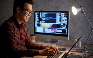 Software devloper working on his laptop