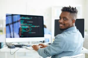 Software developer working in laption in office